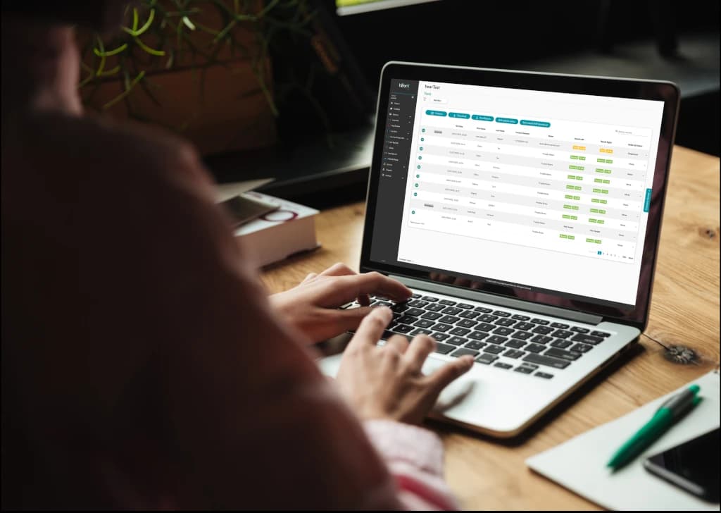 Image showing a person using the hearX Cloud app