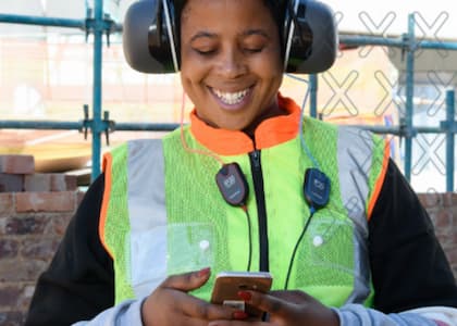 Female conducting occupational health hearing test using hearTest Occ Health